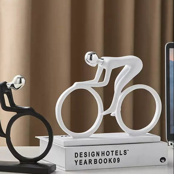 Men Riding Cycle Sculpture