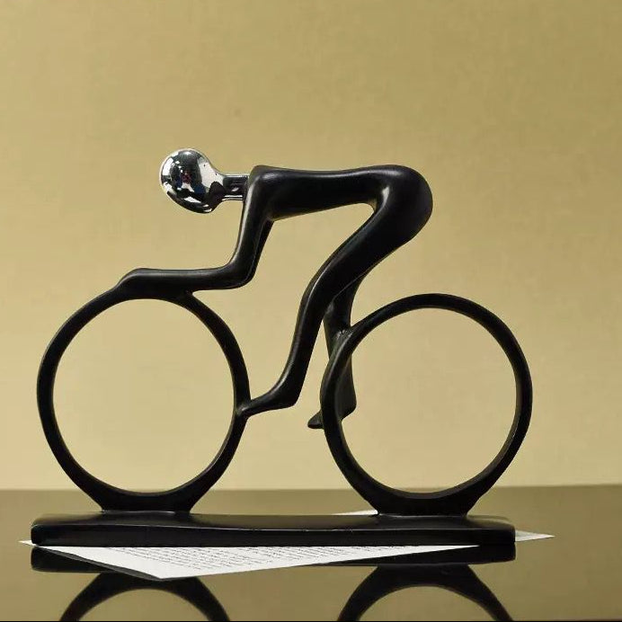 Men Riding Cycle Sculpture