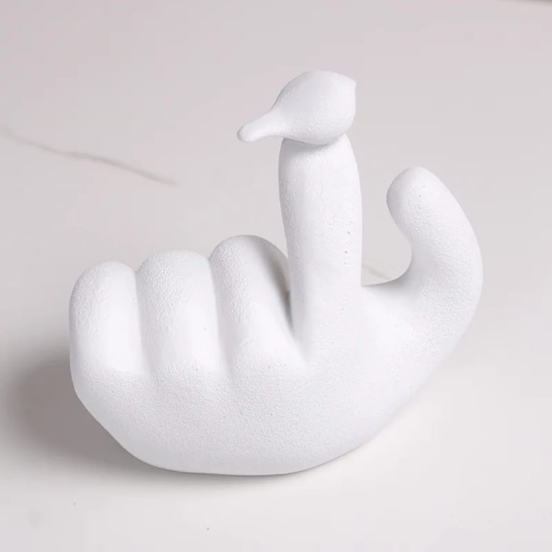 Bird On Hand Sculpture
