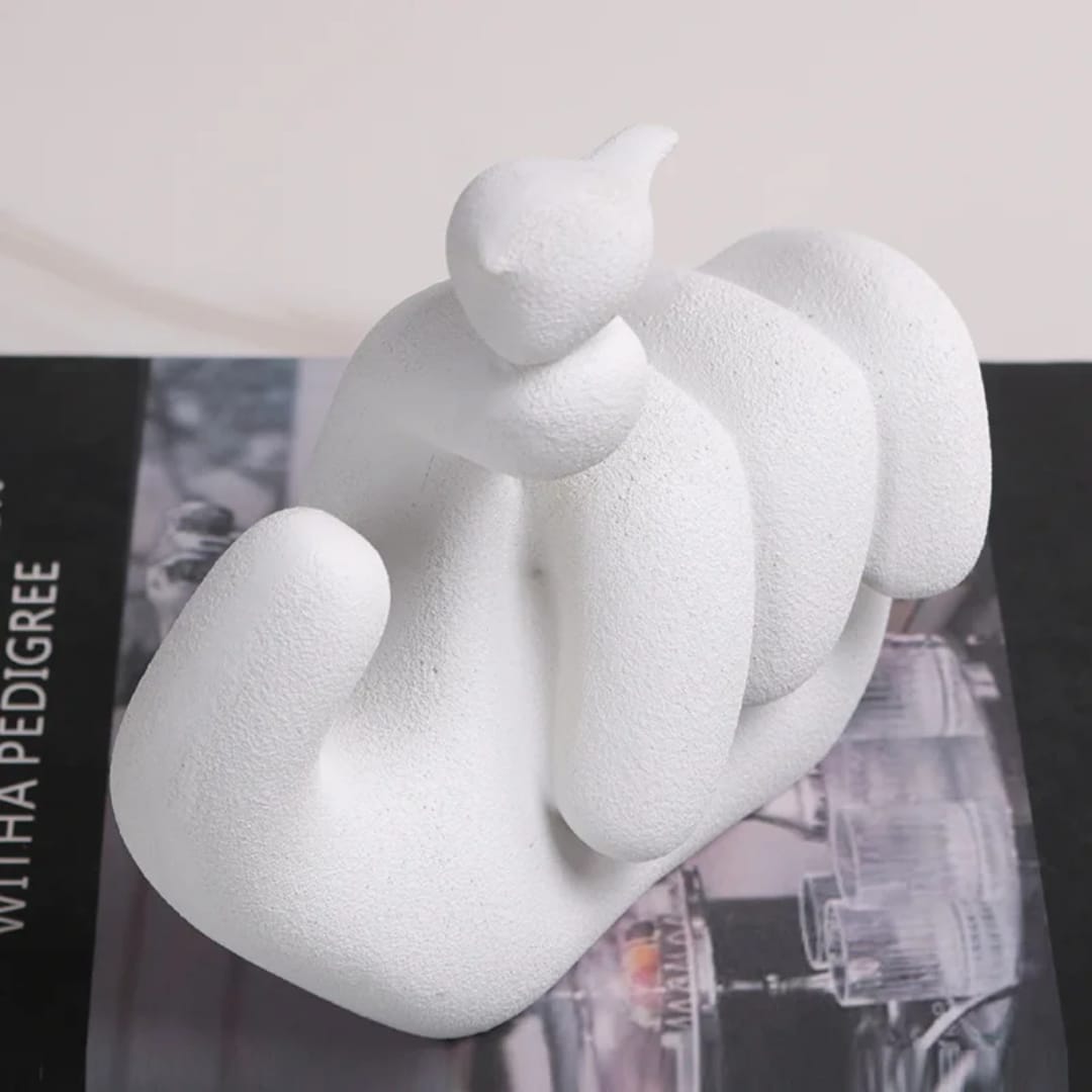 Bird On Hand Sculpture