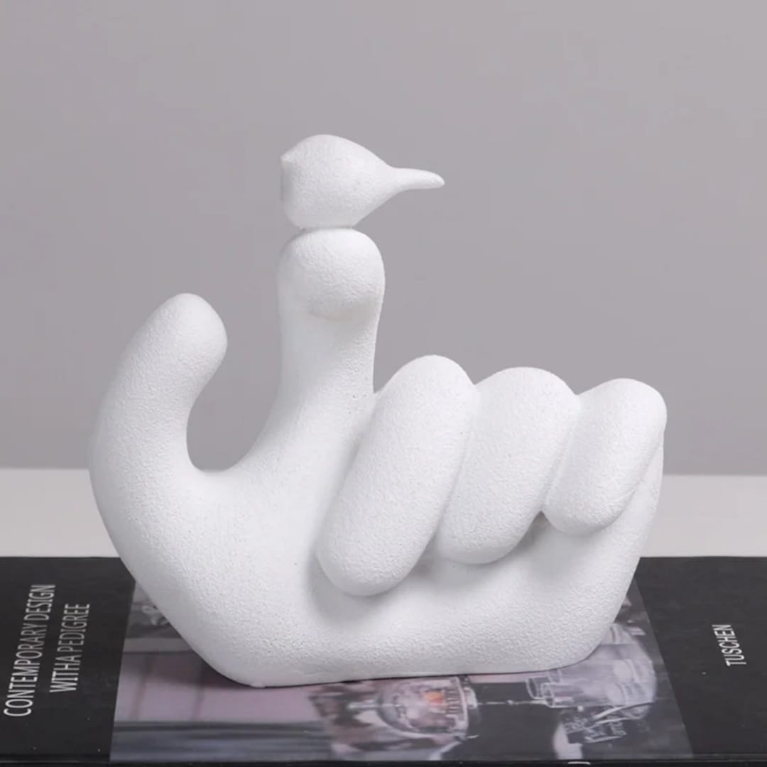 Bird On Hand Sculpture