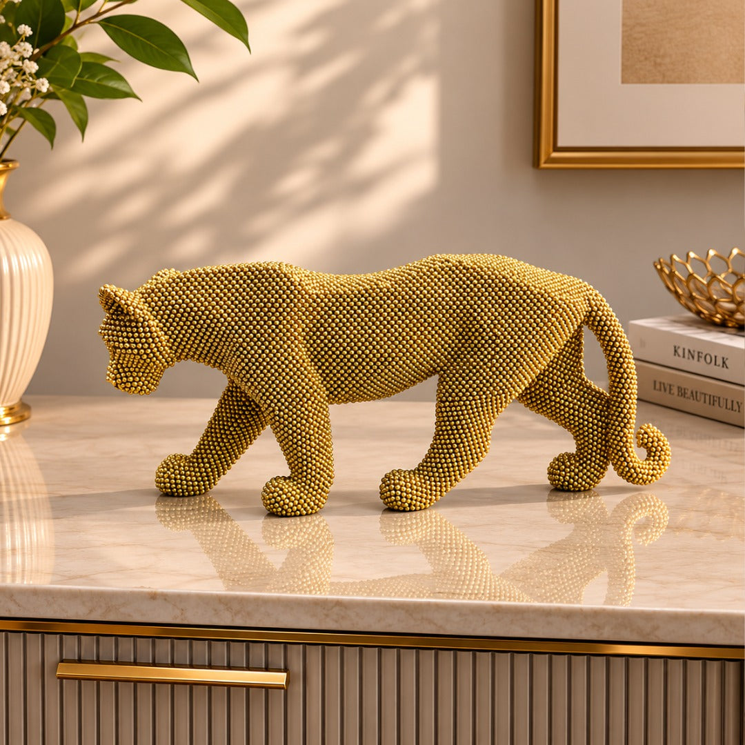 Decorative gold panther sculpture