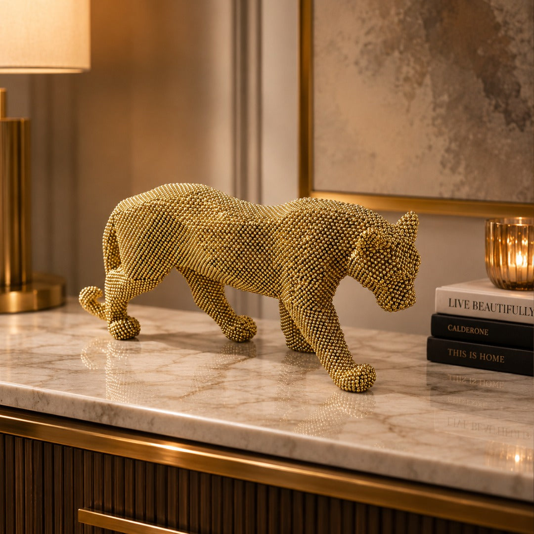 Decorative gold panther sculpture